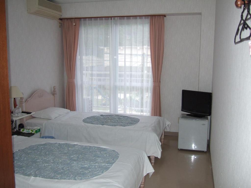 Pension Takatsuki Zamami Szoba fotó